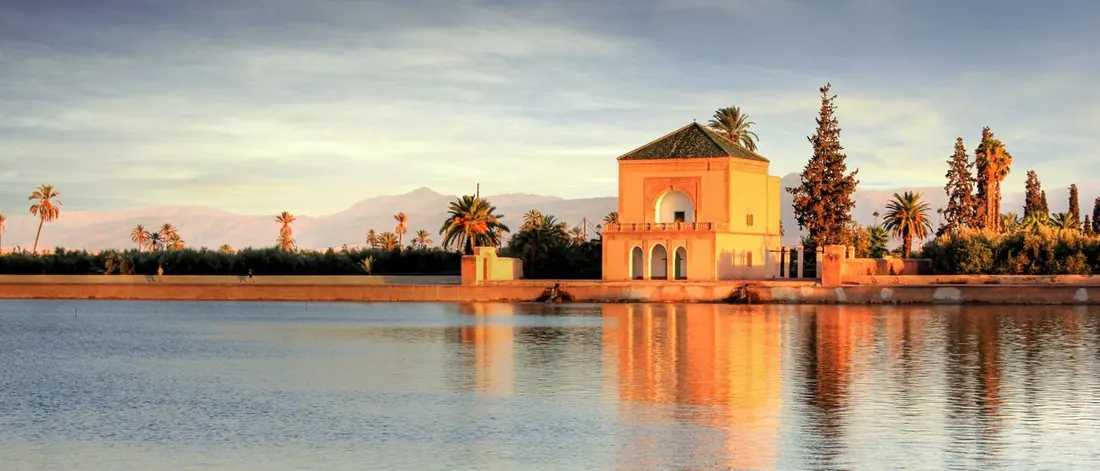 The Menara garden pavilion and basin with the Atlas beyond